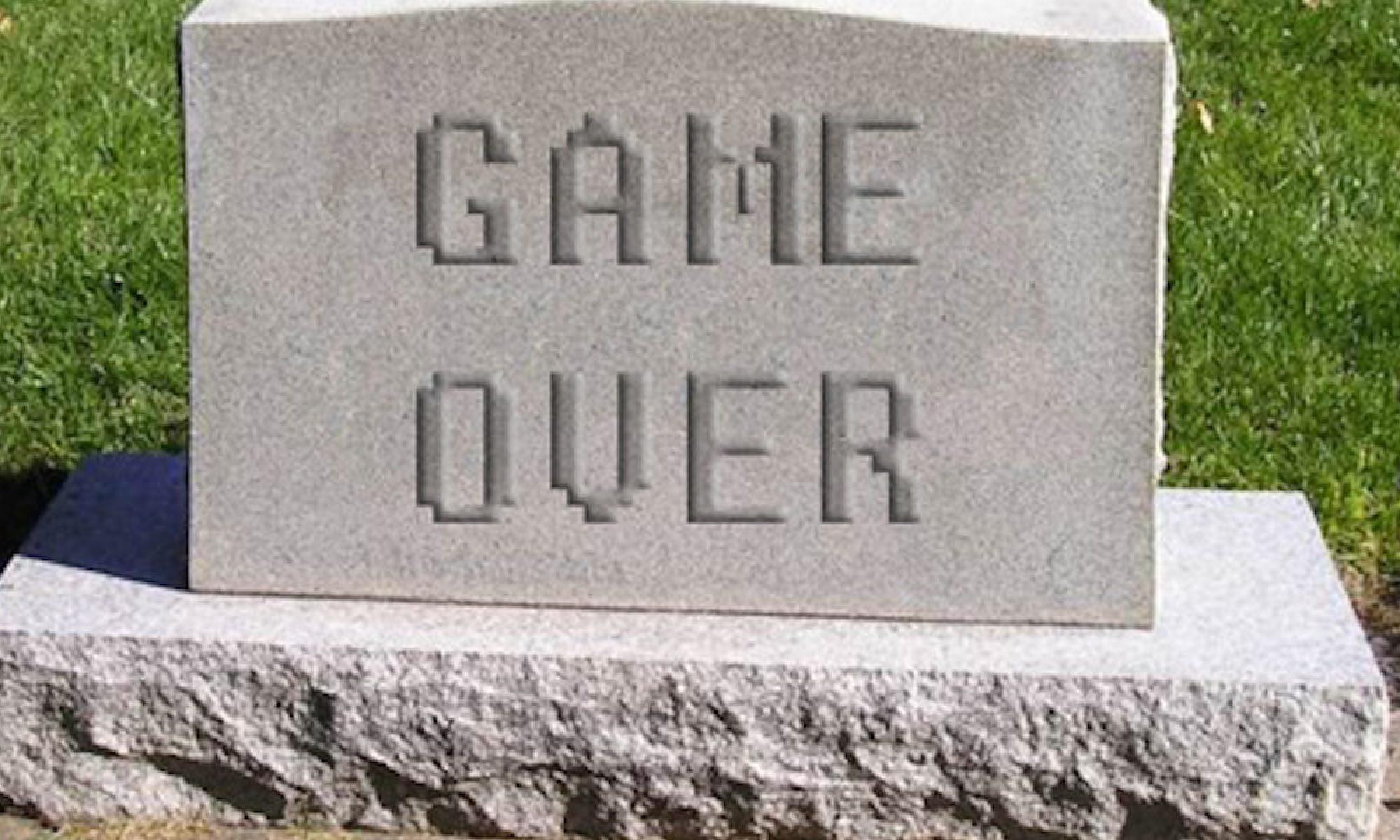 Game Over -teksti hautakivessä