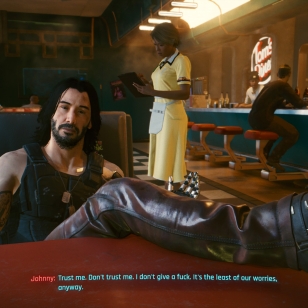 Cyberpunk 2077 Keanu, jalka pois pöydältä