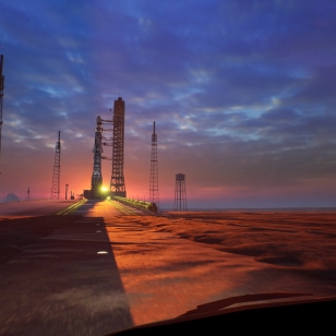 Deliver Us Mars - Raketti auringonnousun aikaan.jpg