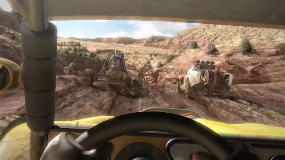 MotorStorm, ohjaamonäkymässä mutaa ja vihollisia